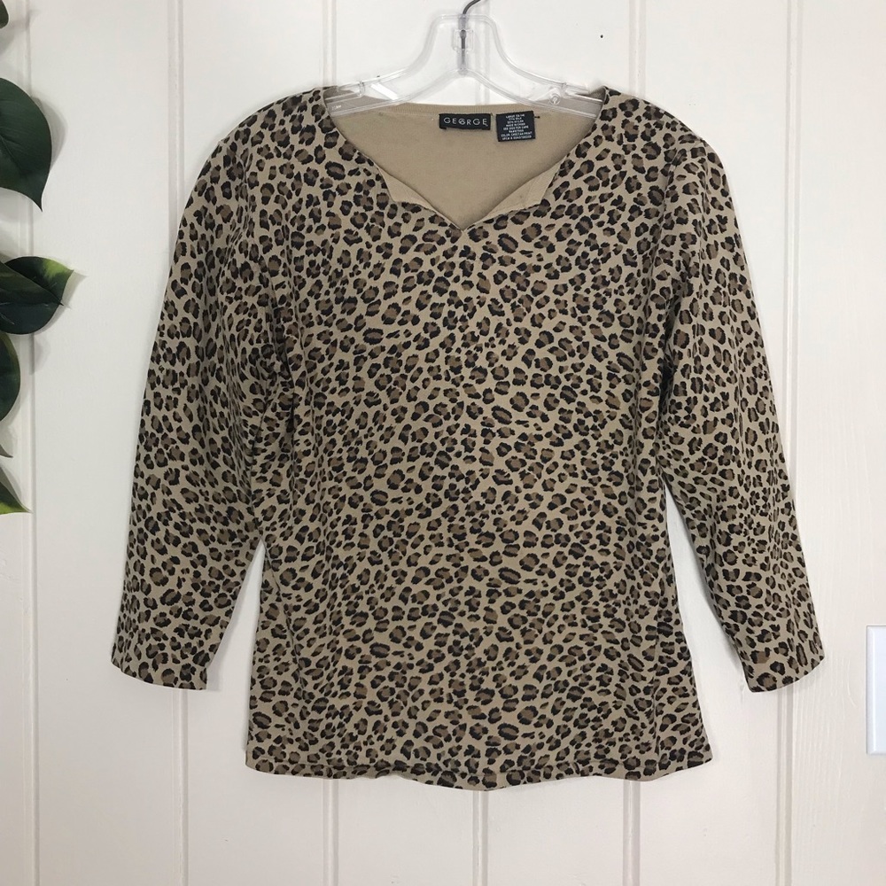 George Brown & Animal Cheetah Print Blouse
3/4 Sleeve
Large
77% Silk 23% Nylon
